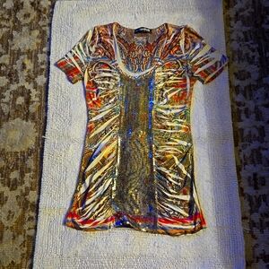 Womens short sleeve top made by lipstick.  Multi color with sequins.  Size med.
